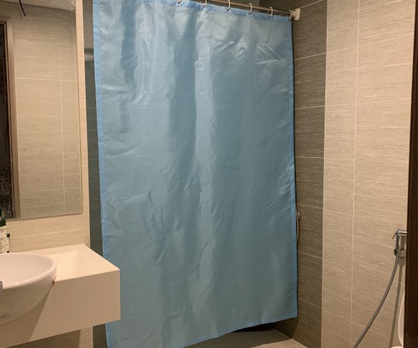 Rèm phòng tắm màu xanh ánh kim chống nước cho nhà bác Hùng tại Quy Nhơn